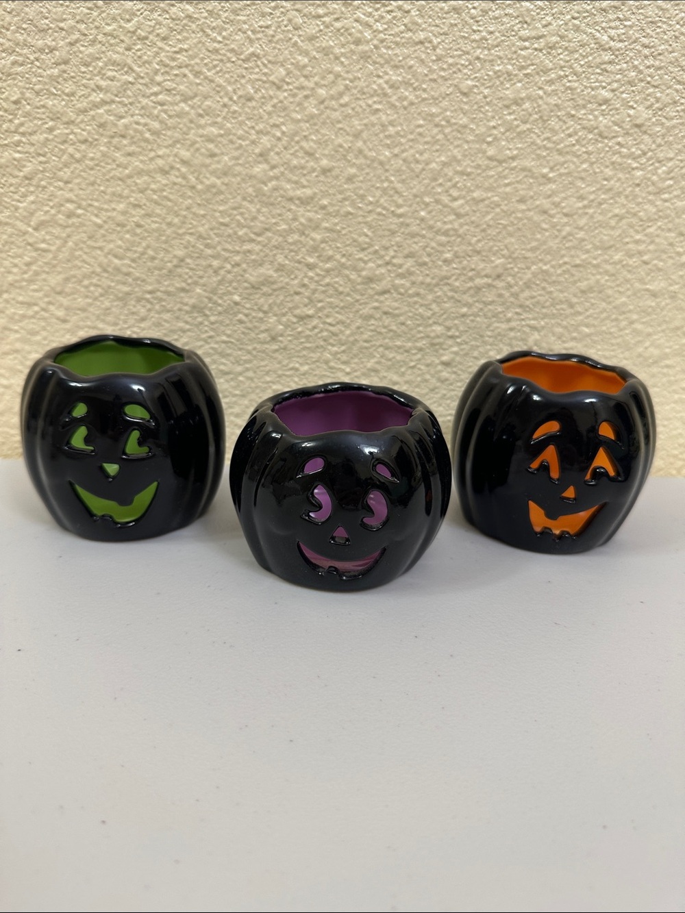 PartyLite Black Pumpkin Tea Light Holders with Green, Purple, Orange Interiors